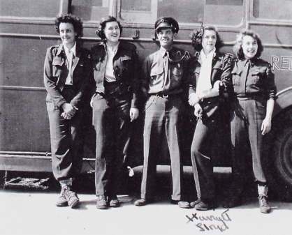 Historic land girls and soldier photograph connected to wartime activity in Norfolk.