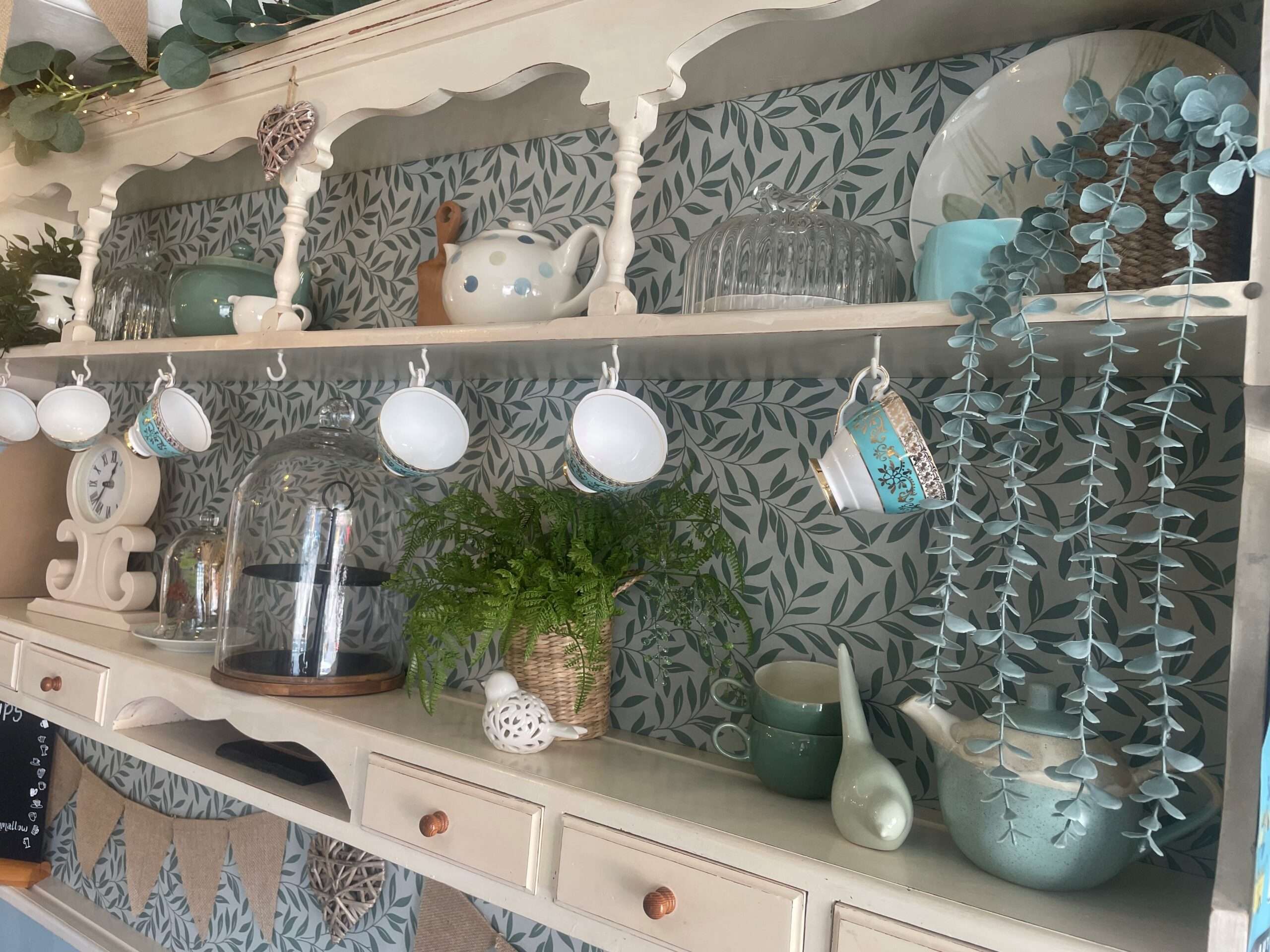 Display of gifts, decorations and homewares inside Mad Hatters tea room.