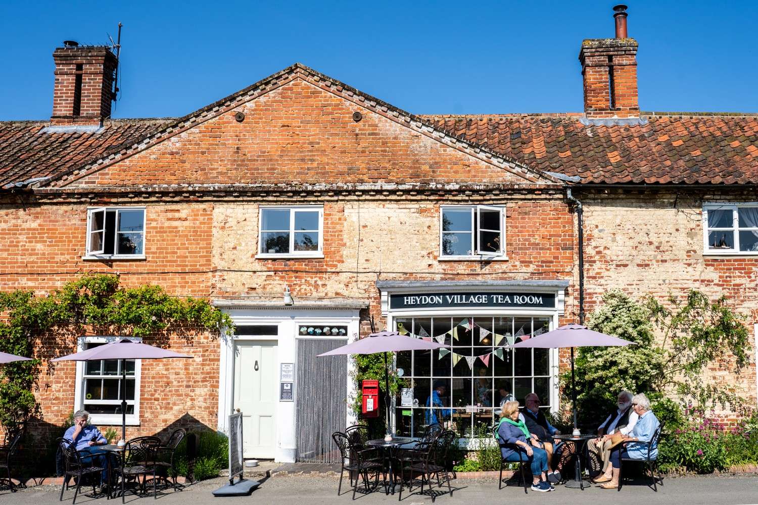 Brick-built tea room exterior in Heydon village with traditional Norfolk character.
